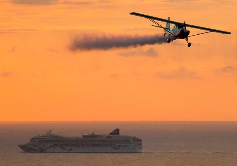 Stunt plane practicing for Cozumel Aeroshow 2016