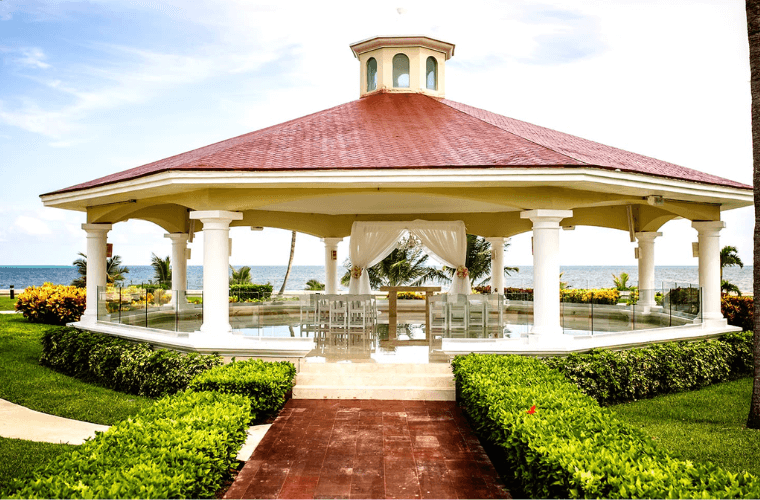 wedding gazebo at Moon Palace with a wedding arch and chairs 