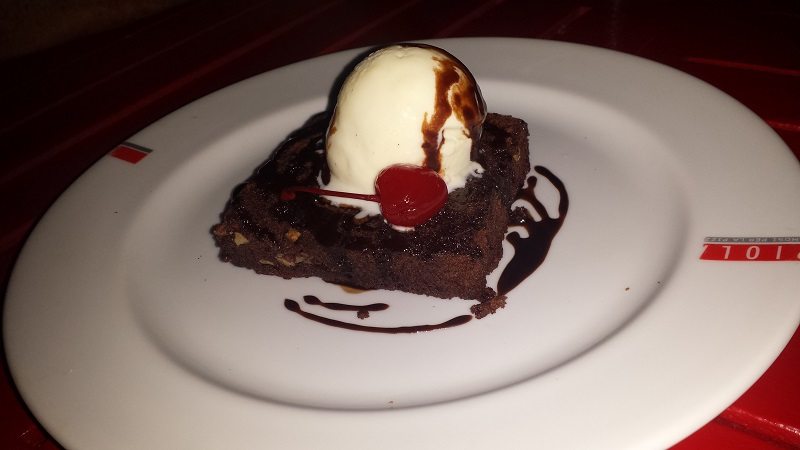 brownie with vanilla ice cream at Piola Restaurant