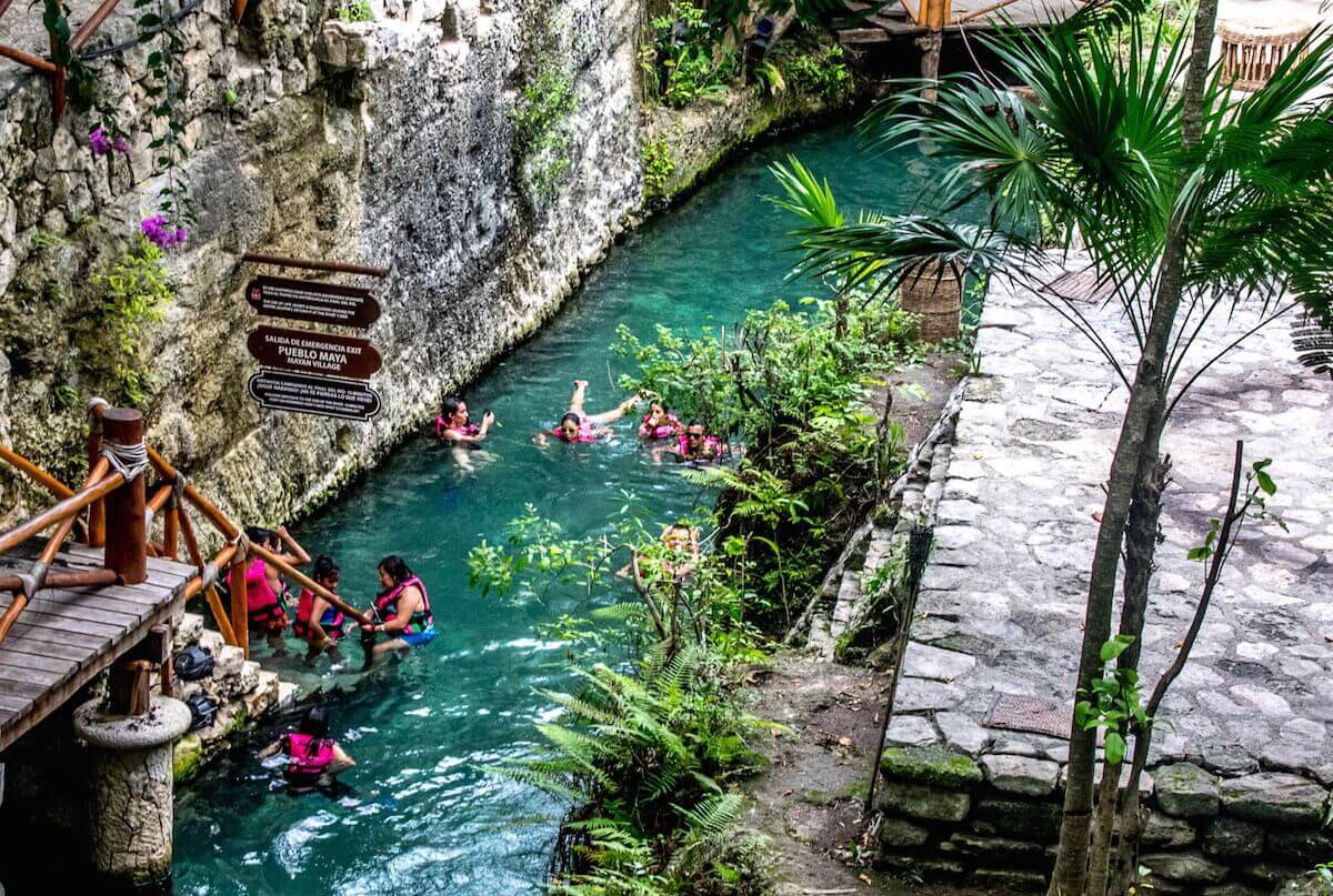 People swimming at Xcaret. 