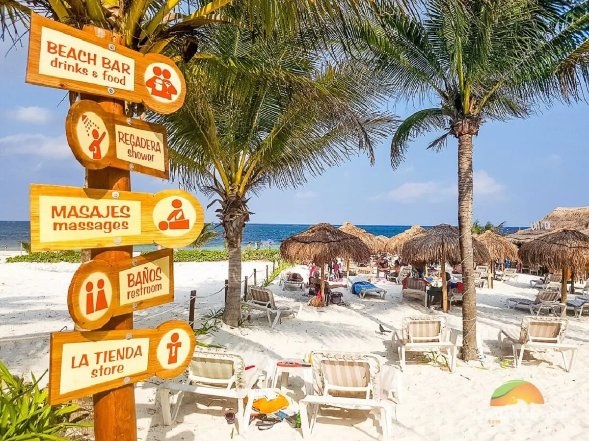 Sign at unico beach puerto morelos