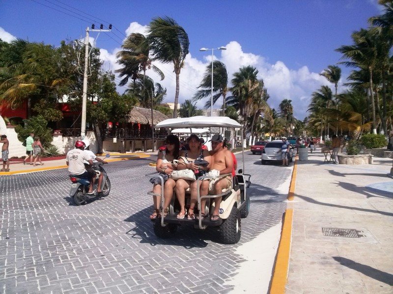 People on cart at isla mujeres