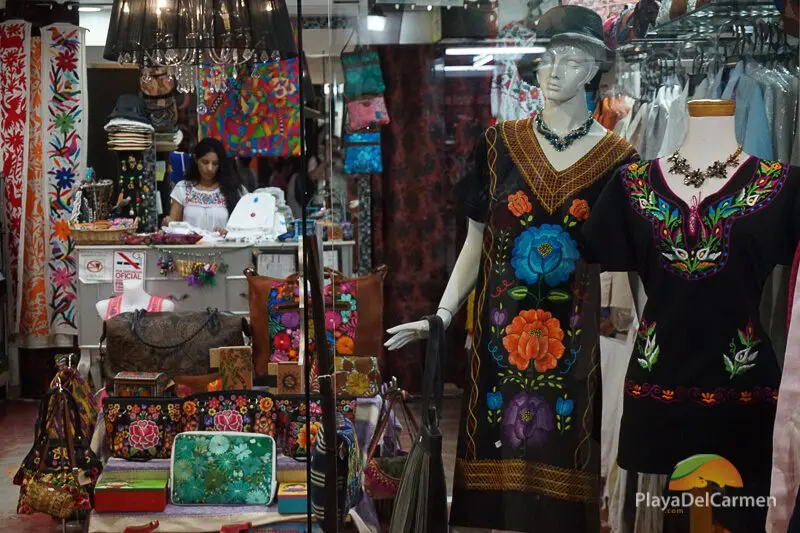 A woman working at a fashion store along 5th Avenue in Playa del Carmen