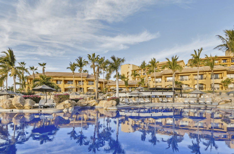 panoramic view of Grand Fiesta Americana Los Cabos with a pool, accommodation, and palm trees