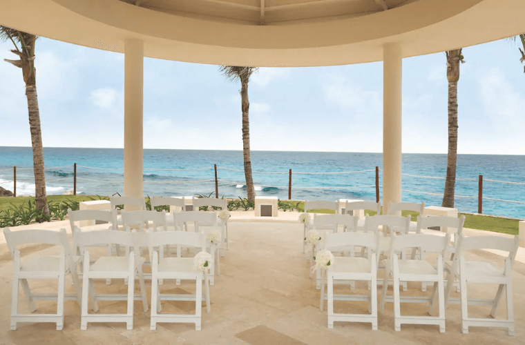 wedding gazebo set with white chairs with views across the Caribbean Sea 