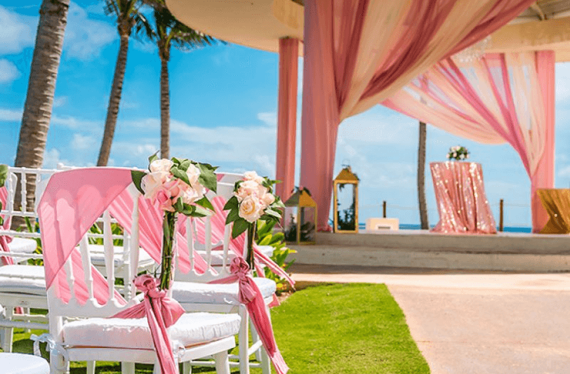 chairs and a wedding arch set out for a wedding in Mexico