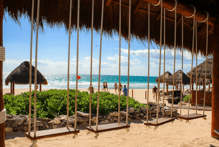 beach swings at the Valentin Imperial Maya