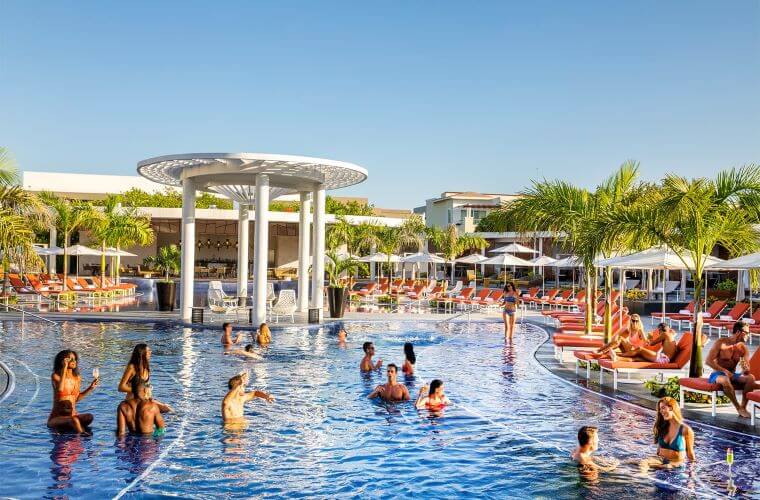 people swimming in the pools at Moon Palace The Grand 