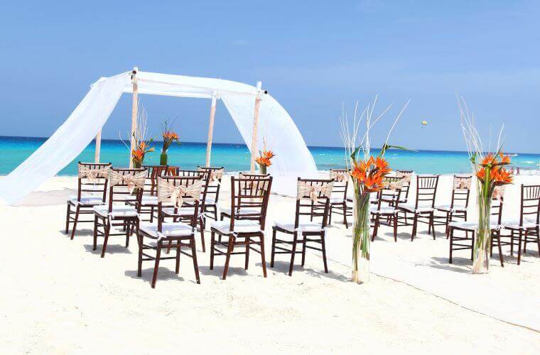 beach wedding setup at Sandos Cancun 