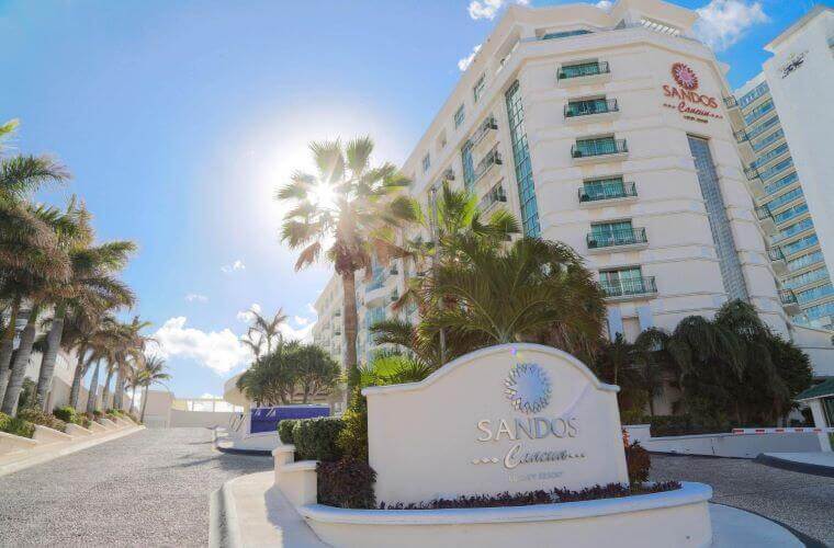 the entrance to Sandos Cancun