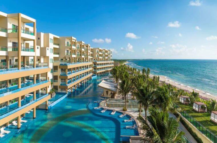 Generations Riviera Maya beachside with pool in the foreground 