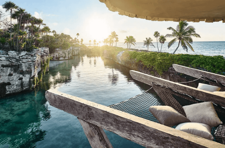 the Caribbean vista from Hotel Xcaret with palm trees