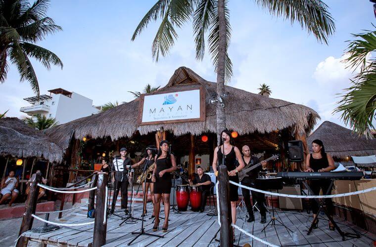 a band performing at Mayan Beach Club 