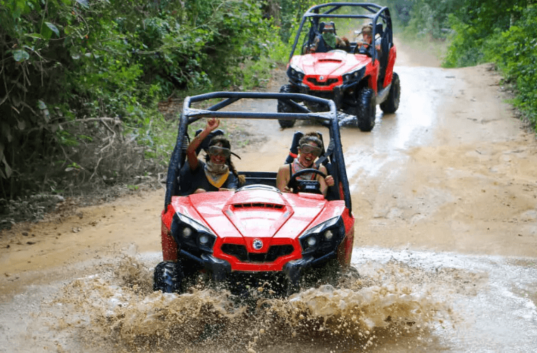 two jungle buggies being driven through the Mexican jungle 