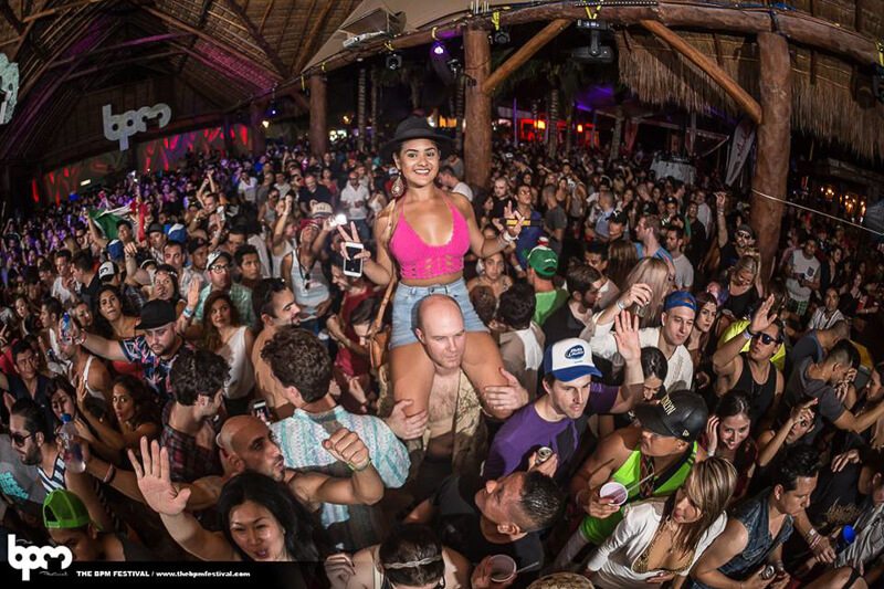 The crowd dances to the beats of the DJ at the BPM Festival in Playa del Carmen