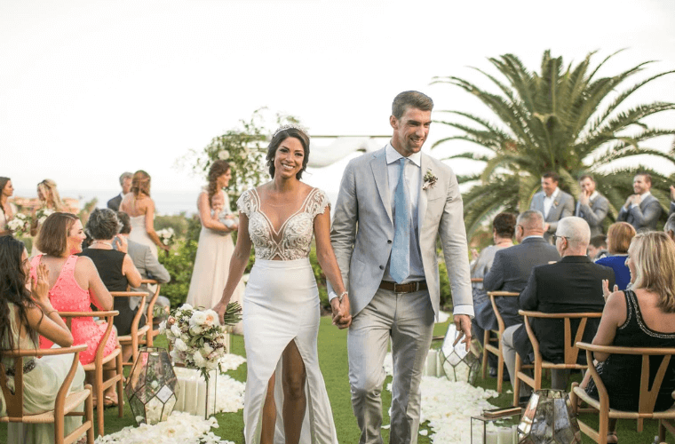 Michael Phelps and Nicole Johnson with guests at their Mexican wedding ceremony