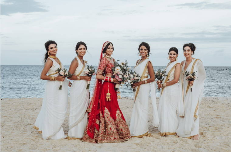 Richa Moorjani with her bridal party on the beach 