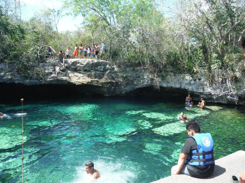 People swimming at Cenote Azul outside of Playa del Carmen