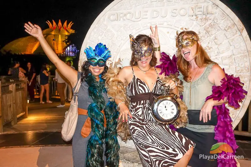 Travel specialists from PlayaDelCarmen.com pose in costume at Cirque Du Soleil Riviera Maya