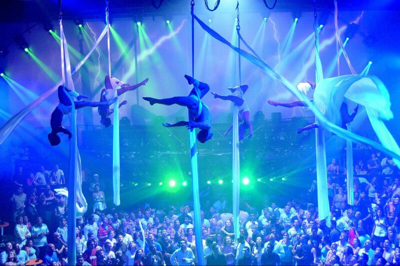 People performing on stage at Coco Bongo 