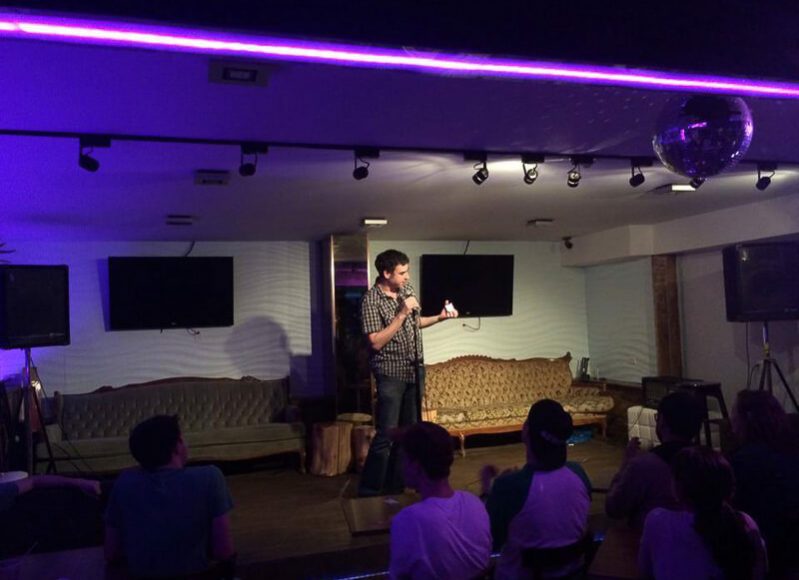 Comedian Jon Selig performs for Comedy Abroad