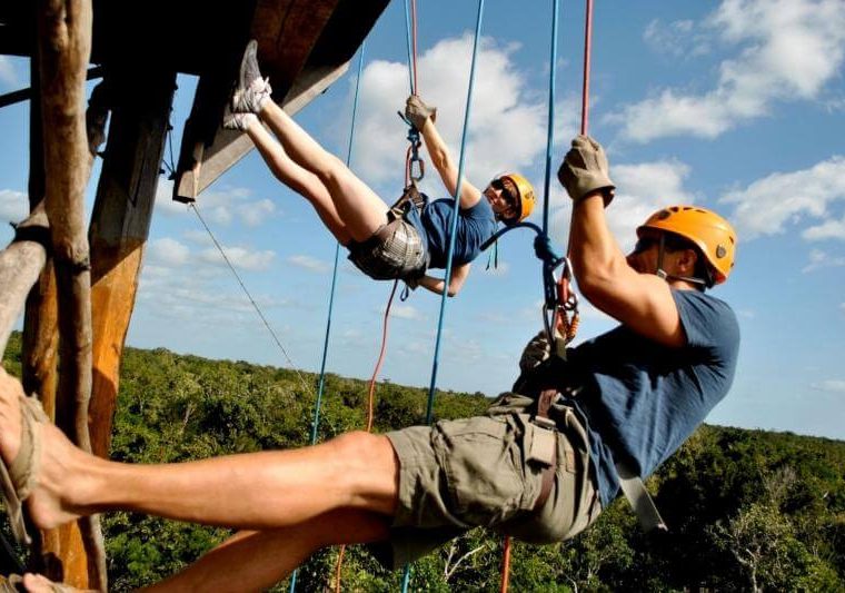 People zip lining at Tulum Xtreme