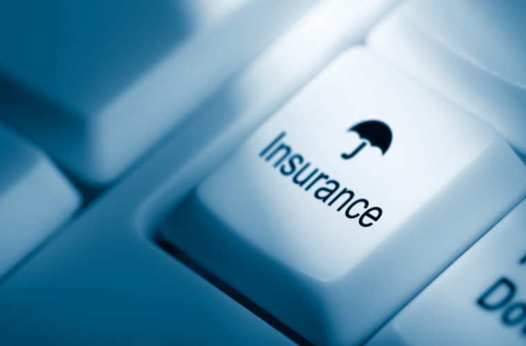 a key on a keyboard with the word insurance on it 