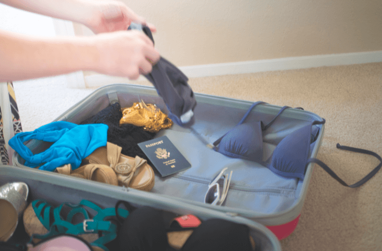 a person packing a case