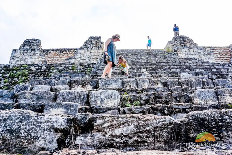 Girl climbing down Ek Mayan Ruins 