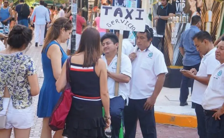 Playa del carmen taxi drivers on the street