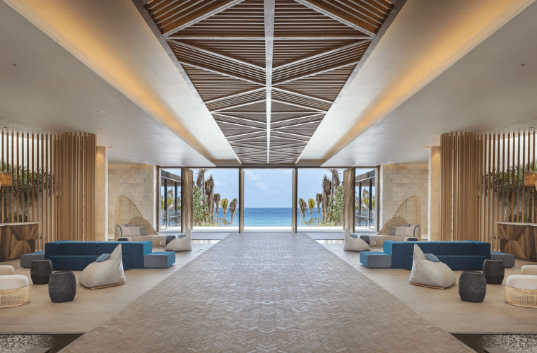 the reception area at Hilton Tulum with views across the Caribbean Sea