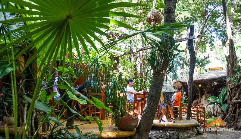 Outisde dinning tables at La Cueva del Chango Playa