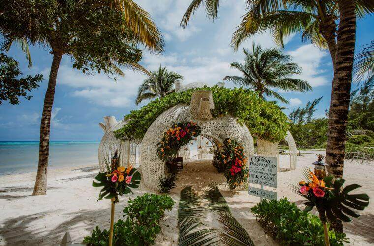 decorated beach gazebo at Sandos Caracol