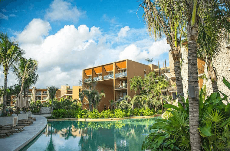 the pool and accommodation buildings at Hotel Xcaret