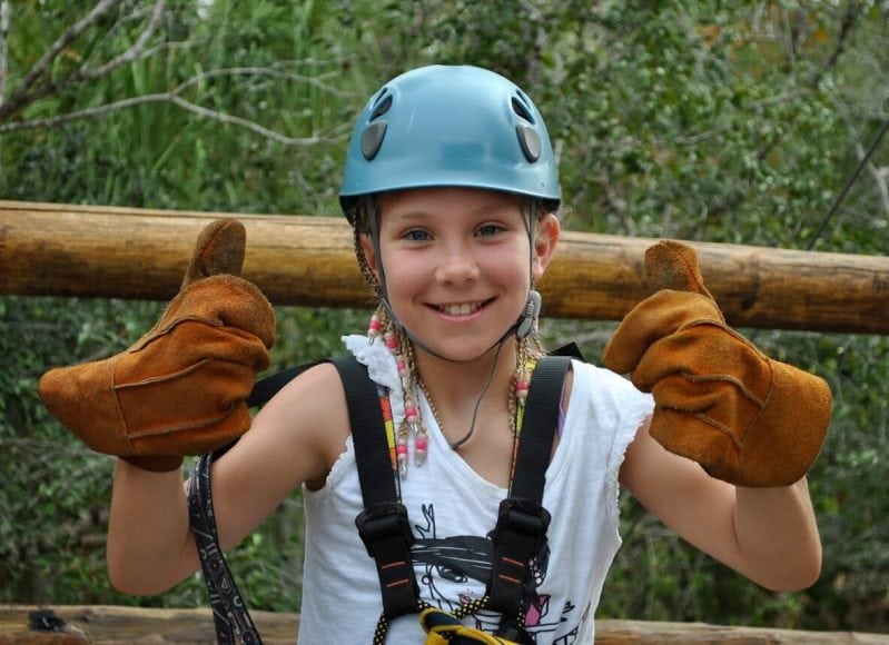 Girl gives two thumbs up on Playa del Carmen zip line tour