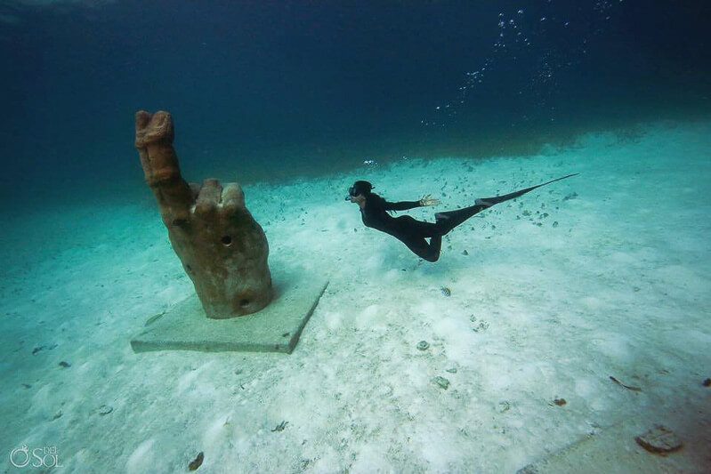 Diver explores artwork at Cancun Underwater Art Museum