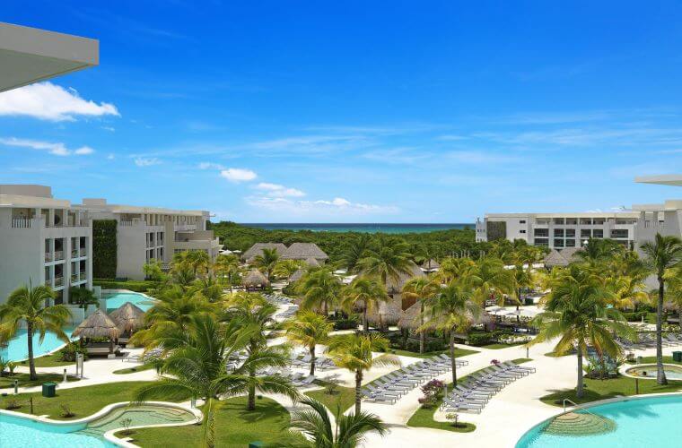 the pool and hotel buildings at Paradisus Playa Del Carmen 