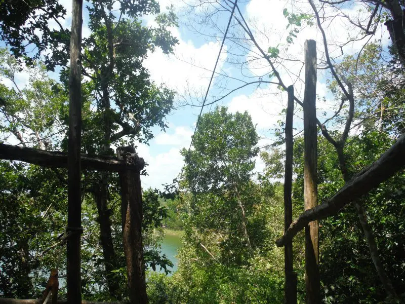 zip line over the lagoon at punta laguna