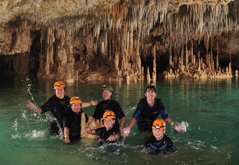 People enjoying the cenotes in the Rio secreto cenote