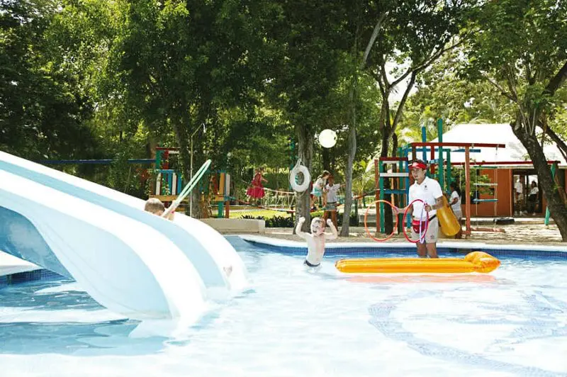 Kid playing in a Riu Yucatan swimming pool