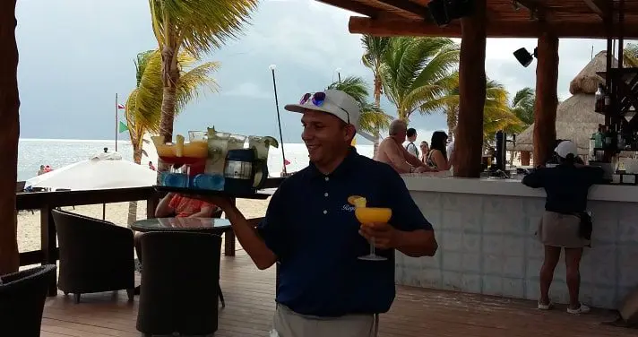 royalton waiter bringing drinks