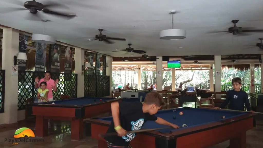 kids playing pool at the sandos caracol sports bar