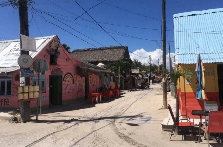buildings with street art on them in Holbox 