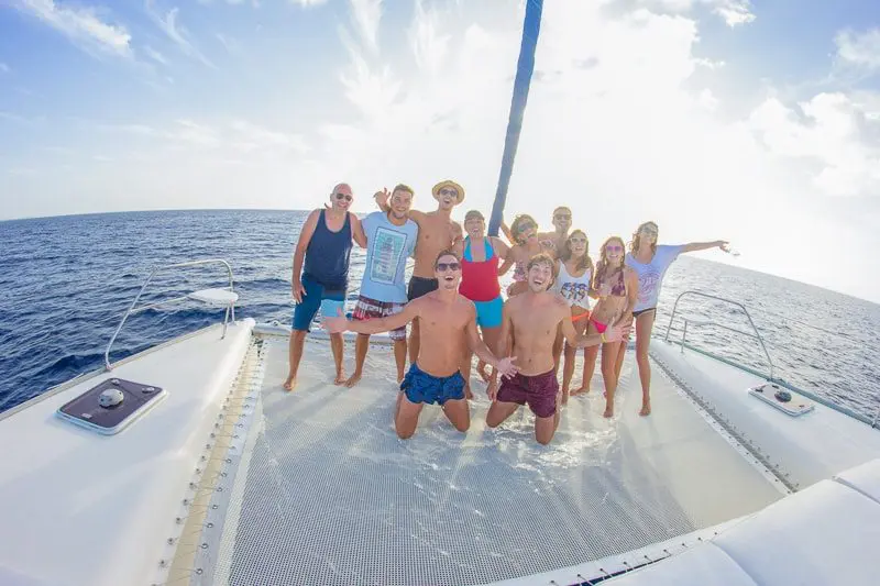 Group pícture aboard a catamaran on the Sunset Sail Playa del Carmen evening cruise