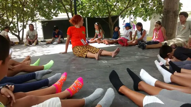 People in a circle at Parque La Ceiba