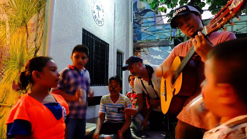 Students learning about music at Unidad Caribe Playa del Carmen