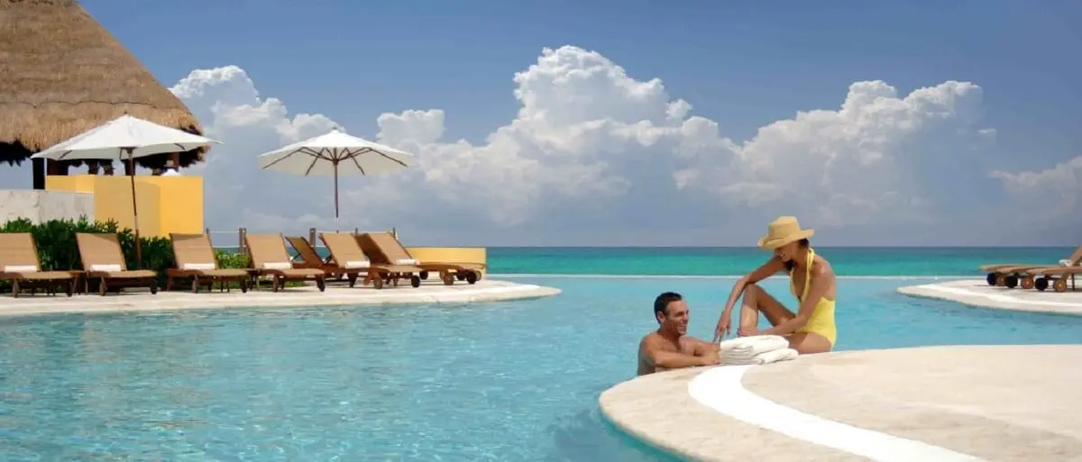 Couple relaxing in pool