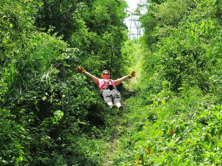 Person ziplining in tulum