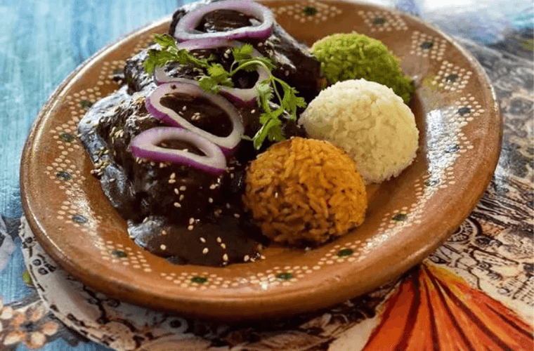 a plate of vegetarian food including rice 