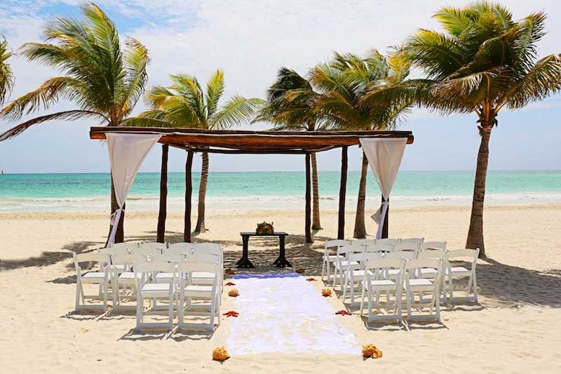 Beach wedding venue set up at Secrets Maroma 